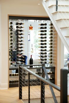 there is a wine rack in the entry way