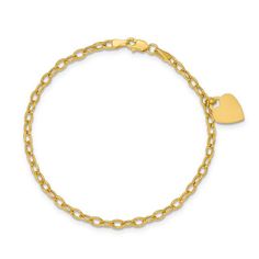 She’ll adore the simple style of this sweet heart charm bracelet. Crafted in 14K gold, this precious look features a polished heart that dangles from a shimmering rolo chain. Buffed to a brilliant luster, this 7.5-inch keepsake bracelet secures with a lobster claw clasp. 14k Gold Charm Bracelet With Heart Charm, Classic Gold Charm Bracelet With Heart, 14k Gold Yellow Gold Charm Bracelet With Heart Charm, 14k Yellow Gold Charm Bracelet With Heart Charm, Elegant Dangle Charm Bracelet With Heart Charm, Elegant Yellow Gold Charm Bracelet With Dangling Charms, Classic Yellow Gold Heart Charm Bracelet, Classic Yellow Gold Bracelet With Heart Charm, Yellow Gold Heart Bracelet With Charms