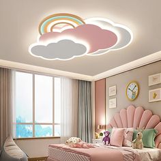 there is a pink bed in the middle of this room with a white cloud above it