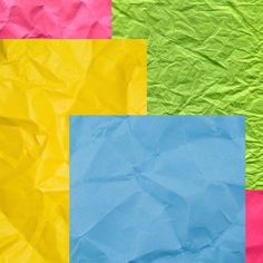 four different colors of paper with some torn off pieces in the middle and one is blue, yellow, pink, green