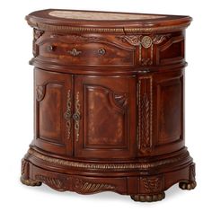 an ornate wooden cabinet with marble top