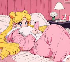 a blonde haired woman laying on top of a bed next to a pink wallpaper