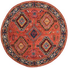 a round rug with many different colors and designs on the center, in an oval shape