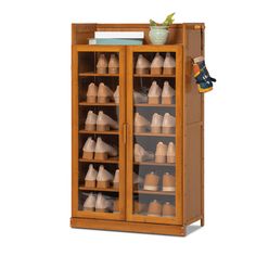 a wooden cabinet filled with lots of shoes