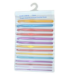 six different colored plastic toothbrushes in a package