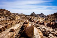 the mountains are covered in rocks and dirt