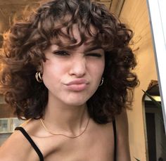 Curly Haircuts Without Bangs, Curly Haircut Bangs Natural Curls, Long Bob Feathered Bangs, Outfits With Short Curly Hair, Shag Curly Hair Short, Short Length Haircut Curly Hair, Short Hair Cuts For Women Wavy Natural, Hair Color Ideas For Pink Skin Tone, Curly Shag Haircut Short Bangs