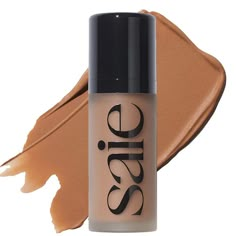 What it is: A lightweight, buildable liquid-cream bronzer that blends seamlessly into skin for a subtly defined bronze with a dewy, soft-focus finish. Finish: Natural Formulation: Liquid Highlighted Ingredients: - Plant-Derived Glycerin: A powerful humectant known to increase skin's natural moisture level. - Licorice Root Extract: Brightens the overall appearance of skin.- Silica: Provides a smooth, soft feel, and an even application while helping to blur.Ingredient Callouts: This product is vegan, gluten-free, cruelty-free, and comes in recyclable packaging.What Else You Need to Know: Dew Bronze's sheer formula is buildable, blendable, and blurring for a seamless flush of bronzed color that's never streaky, cakey, or orange. Its chunky doe-foot is designed for the most fool-proof targeted Saie Bronzing Drops, Race Makeup, Bronze Drops, Skincare Stuff, Liquid Bronzer, Bronzer Makeup, Dream Makeup, Makeup Wishlist, 2024 Wishlist