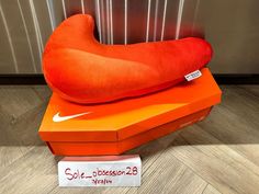 NIKE BIRTHDAY PACK GIANT NIKE SWOOSH PILLOW ORANGE "IN HAND" | eBay Nike Gift Ideas, Nike Pillow, Nike Birthday, Nike Air Max 90 Ltr, Hand Fashion, Nike Dunk High, Air Vapormax, Nike Air Vapormax, Nike Swoosh