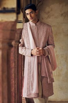 Dusty rose sherwani with tonal dori, beads and crystal embroidery in abstract floral pattern. Paired with matching kurta, churidar and an embroidered border stole. - Aza Fashions Elegant Sherwani With Dupatta For Reception, Pink Sherwani With Mirror Work For Designer Wear, Bollywood Style Pink Sherwani With Mirror Work, Pink Bollywood Sherwani With Mirror Work, Elegant Designer Sherwani With Dupatta, Traditional Raw Silk Sherwani With Mirror Work, Elegant Semi-stitched Bandhgala With Dupatta, Pink Sherwani With Mirror Work For Festivals, Pink Mirror Work Sherwani For Festivals