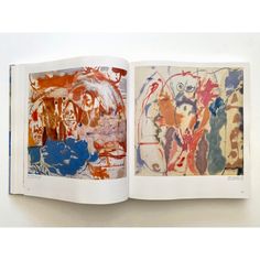 an open book with multiple paintings on it