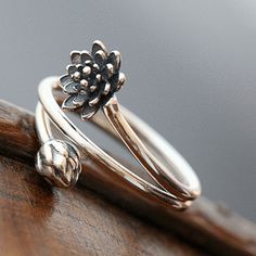 Delivery within 2-5 business days.   This Lotus ring represents various philosophical and religious views related to enlightenment.     🌟One of the Eight Auspicious Symbols of Buddhism, the lotus flower symbolizes purity and liberation. It is deeply rooted in muddy waters, but it blossoms above the mud and turns into Eight Auspicious Symbols, Lotus Flower Ring, Gem Rings, Lotus Ring, Golden Lotus, Silver Rings Simple, Silver Ring Designs, The Lotus Flower, Muddy Waters