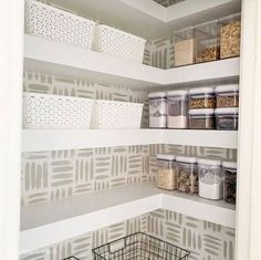 the pantry shelves are organized with baskets and other items to keep things fresh in their bins