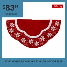 a red bib with white snowflakes on it and the words $ 8 99 reg