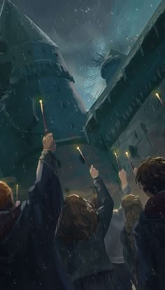 harry potter and the goblet of fire at hogwart's castle with their wands