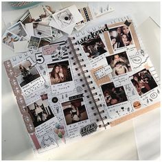 an open notebook with photos and stickers on it