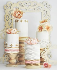 three different types of cakes with flowers on them