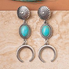 Capture the essence of Western style with the Layers of Western Earrings. With a triple layer 3 dangle, a concho style post back, this statement earring is perfect for making a stylish impression. The oval stone layer and mini squash layer in either turquoise and silver or copper and white bring together an elegant and fashionable piece that will be sure to turn heads. Crescent Earrings, Western Earrings, Earrings Turquoise, Statement Earring, Western Jewelry, Oval Stone, Western Style, Turquoise Stone, 2 Colours