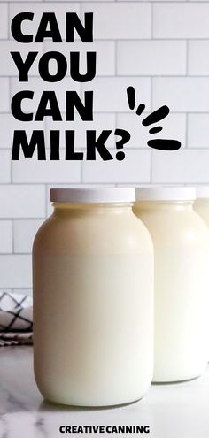 three jars with milk in them sitting on a counter