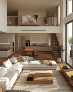 a modern living room with white furniture and wood flooring is seen in this image