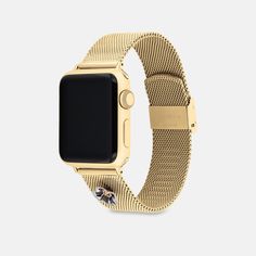 Made exclusively for use with the 38mm 40mm and 41mm Apple Watch® this sleek gold tone mesh bracelet strap is detailed with a stainless steel Tea Rose charm. | Coach Apple Watch® Strap, 38 Mm, 40 Mm And 41 Mm - Women's - Gold Coach Gold Watch As A Gift, Coach Gold Watch As Gift, Coach Gold Watch For Gift, Gold Bracelet Strap Apple Watch Band, Modern Coach Gold Watch, Luxury Gold Coach Watch Accessories, Modern Gold Coach Watch, Coach Gold Watch With Metal Dial, Coach Gold Watches With Metal Dial