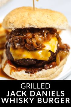 grilled jack daniels whiskey burger on a plate with fries