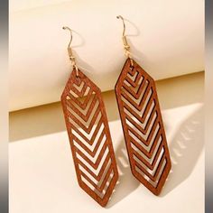 These Chevron Dangles Are Made From Lightweight Wood And Feature A Chevron Design. These Stylish Dangles Are Versatile Enough To Pair With Any Look. Perfect For Casual Wear Or Dressy Occasions. 9.2cm X 2cm Wood Dangle Earrings, Color Cafe, Watches Women Fashion, Wooden Earrings, Hexagon Shape, Wood Earrings, Girls Earrings, Wooden Jewelry, Boutique Jewelry