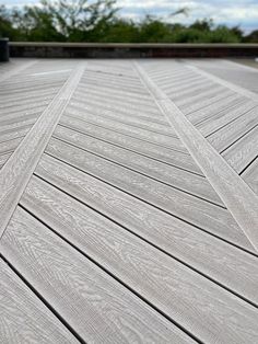 close up images of the oyster beige coloured composite decking laid for a customer in a stylish herringbone pattern. Herringbone Deck Patterns, Composite Decking Ideas Garden, Herringbone Decking, Deck Board Patterns, Herringbone Deck, Composite Decking Ideas, Cottage Deck