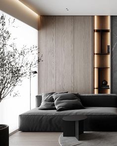 a living room filled with furniture and a tree in the corner on the wall next to it