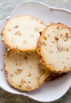 three pieces of bread sitting on top of a white plate