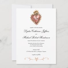 a wedding card with an ornate heart on it