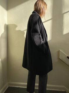 Beautiful 90s boiled wool coat. Stunning structure with a unique outer seam detail. Very warm.  Fits up to medium. Measurements: Fitted Cashmere Long Coat, Fitted Long Cashmere Coat, Black Cashmere Wool Coat For Winter, Winter Black Cashmere Wool Coat, Fitted Long Sweater Coat For Cold Weather, Oversized Structured Wool Outerwear, Wool Long Coat Cardigan For Fall, Oversized Wool Sweater Coat For Fall, Classic Oversized Merino Wool Outerwear