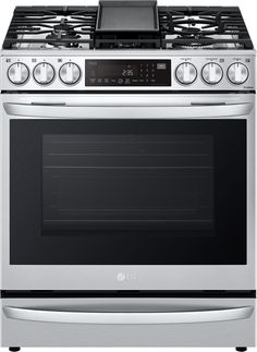 an oven with the door open and electronic controls on it's front burner