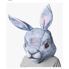 an image of a rabbit mask on top of a person's head with the words,