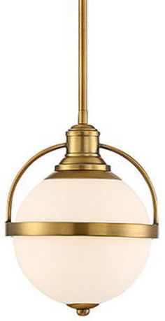 a light fixture with a white glass ball hanging from the bottom and an antique brass finish