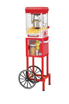 an old fashioned popcorn machine with wheels