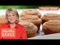 a woman standing in front of a tray of sugar buns with the words martha bakes on it