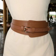 The belt is 105 cm (31 inches) long. Crafted from high-quality genuine leather, this belt offers both durability and a luxurious feel. Its sleek design makes it an ideal accessory for any outfit, whether you're dressing up for a formal occasion or adding a polished touch to your everyday look. The belt features a classic buckle that complements its minimalist style, ensuring it pairs effortlessly with jeans, trousers, or dresses. Available in multiple sizes and colors, it's designed to fit comfo Formal Leather Belt With Gold-tone Hardware, Leather Belts With Gold-tone Rectangular Buckle, Belt Storage, Wide Belts, Black Leather Belts With Gold-tone Hardware, Womens Leather Belt, Women's Belts, Wide Leather Belt, Custom Belt