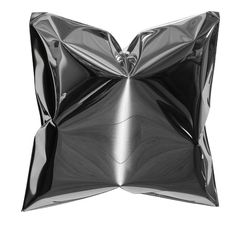 a black and white photo of a pillow made out of shiny material on a white background