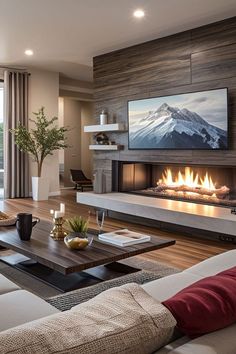 a living room filled with furniture and a flat screen tv mounted on the wall above a fire place