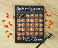 a chalkboard calendar with candy corn on it