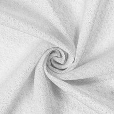 an image of a white fabric textured with small dots on the top and bottom