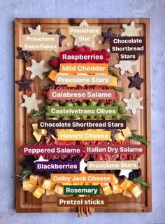 a wooden platter filled with different types of food on top of a blue wall