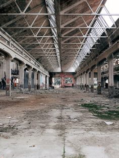 an abandoned building with graffiti on the walls