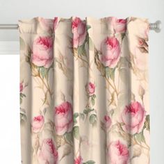 a curtain with pink flowers on it in front of a window