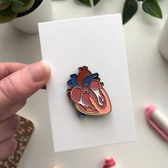 This vibrant Anatomy Heart Organ Brooch is the perfect addition to any style. Crafted from zinc alloy and enamel with a heart-shaped pattern, it's perfect for doctors, nurses, and medical students alike. Wear it as a lapel, backpack, or badge and feel the connection to healthcare professionals of today. Gift it to someone special and show the world your Trendy style! Gifts For Medical Students Med School, Human Anatomy Gifts, Christmas Gifts For Med Student, Heart Patient Gifts, Organ Jewelry, Gifts For Medical Students, Anatomy Heart, Heart Organ, Medical Pins