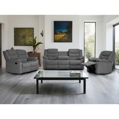 a living room with two recliners and a coffee table