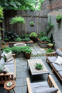 an outdoor patio with wooden furniture and potted plants