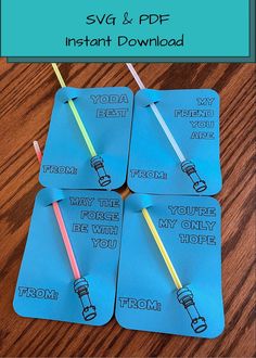 four star wars inspired tags with lightsabes on them