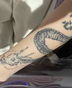 a person with a tattoo on their arm